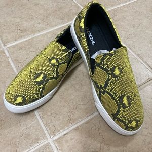 Slip on snake print sneakers